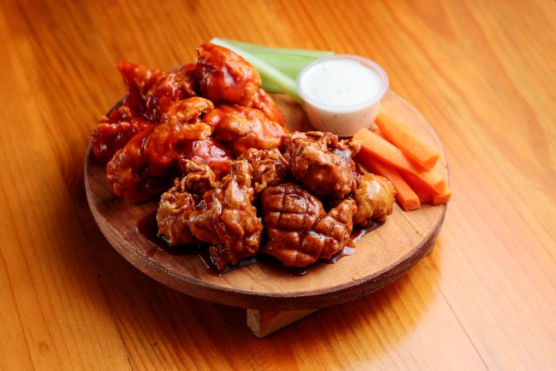 BBQ wing feast deal with fries and sides